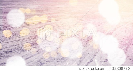 Defocused lights against snow covered land 133808750