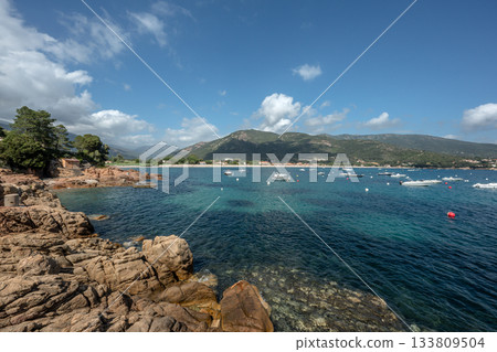 Spectacular view Golf at Sagone Corsica France beautyful sand Beach boats mountain village Tourism and vacations concept Spectacular view Golf at Sagone Corsica France beautyful sand Beach boats mountain village Tourism and vacations concept 133809504