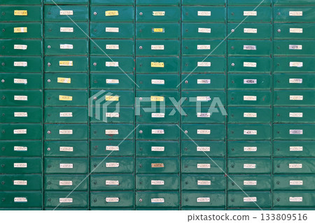 Wall of mail boxes outside a post office Wall of mail boxes outside a post office 133809516
