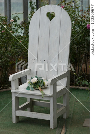 White bench and white roses White bench and white roses 133809677