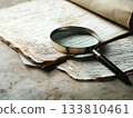 Magnifying glass on old 133810461