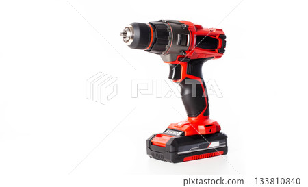 Modern red drill-screwdriver on a white background. Tool for work in industry, isolate Modern red drill-screwdriver on a white background. Tool for work in industry, isolate 133810840