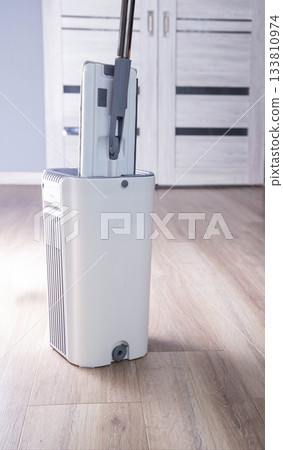Gray modern bucket for cleaning and cleaning the room, copy space for text, industry 133810974