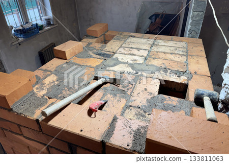 Brickwork of a heating stove. Channel ceiling. Brickwork of a heating stove. Channel ceiling. 133811063