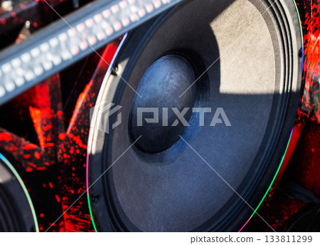 Closeup Of A Subwoofer With Carbon Fiber Cone. High-Quality Speaker Mounted In Custom Box. Closeup Of A Subwoofer With Carbon Fiber Cone. High-Quality Speaker Mounted In Custom Box. 133811299
