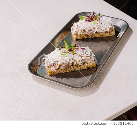 Delicious open-faced sandwich topped with meat and coconut served for lunch Delicious open-faced sandwich topped with meat and coconut served for lunch 133811465