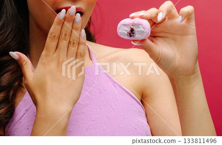 Sweet treat revealed with surprise filling during fun snack time Sweet treat revealed with surprise filling during fun snack time 133811496