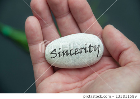 Stone showing Sincerity Text text engraved on it. Stone showing Sincerity Text text engraved on it. 133811589