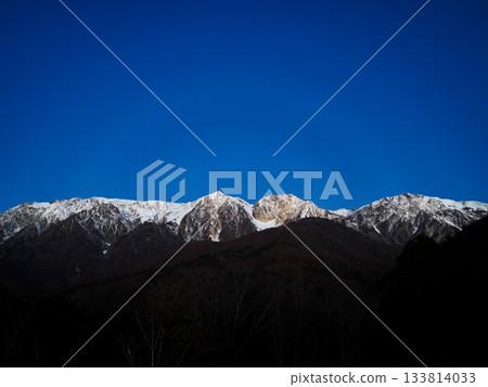 View of the Hakuba mountain range at dawn from the campsite at Hakuba Iwatake Mountain Resort 133814033