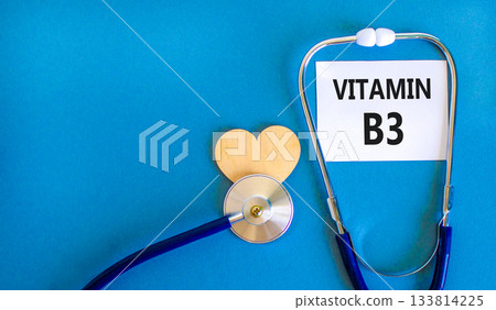 Vitamin B3 niacin symbol. Concept words Vitamin B3 on beautiful white card. Wooden heart and stethoscope. Beautiful blue background. Medical healthy lifestyle Vitamin B3 niacin concept. Vitamin B3 niacin symbol. Concept words Vitamin B3 on beautiful white card. Wooden heart and stethoscope. Beautiful blue background. Medical healthy lifestyle Vitamin B3 niacin concept. 133814225