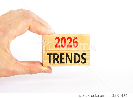 2026 Trends new year symbol. Concept words 2026 Trends on beautiful wooden blocks. Beautiful white paper background. Businessman's hand. Business and 2026 Trends new year concept. Copy space. 2026 Trends new year symbol. Concept words 2026 Trends on beautiful wooden blocks. Beautiful white paper background. Businessman's hand. Business and 2026 Trends new year concept. Copy space. 133814243