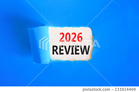 2026 Review symbol. Concept words 2026 Review on beautiful white paper. Beautiful blue paper background. Business and 2026 review concept. Copy space. 133814409