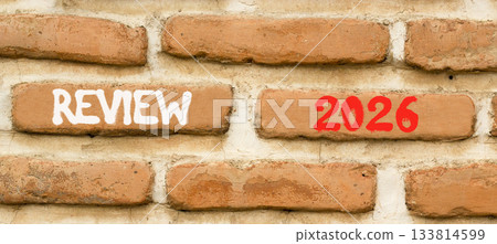 Review 2026 symbol. Concept words Review 2026 on beautiful brown brick wall. Beautiful brown brick wall background. Business and review 2026 concept. Copy space. Review 2026 symbol. Concept words Review 2026 on beautiful brown brick wall. Beautiful brown brick wall background. Business and review 2026 concept. Copy space. 133814599