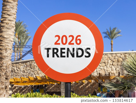 2026 Trends new year symbol. Concept words 2026 Trends on beautiful white and red road sign. Beautiful palm trees palm-trees and blue sky background. Business 2026 Trends new year concept. Copy space. 2026 Trends new year symbol. Concept words 2026 Trends on beautiful white and red road sign. Beautiful palm trees palm-trees and blue sky background. Business 2026 Trends new year concept. Copy space. 133814617