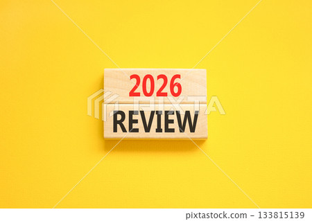 2026 Review symbol. Concept words 2026 Review on beautiful wooden blocks. Beautiful yellow paper background. Business and 2026 review concept. Copy space. 2026 Review symbol. Concept words 2026 Review on beautiful wooden blocks. Beautiful yellow paper background. Business and 2026 review concept. Copy space. 133815139