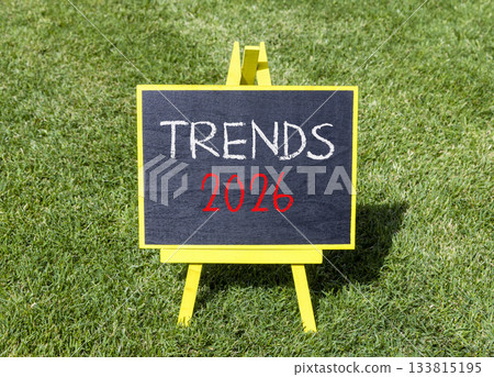 Trends 2026 new year symbol. Concept words Trends 2026 on beautiful black blackboard. Beautiful green grass background. Business and Trends 2026 new year concept. Copy space. Trends 2026 new year symbol. Concept words Trends 2026 on beautiful black blackboard. Beautiful green grass background. Business and Trends 2026 new year concept. Copy space. 133815195