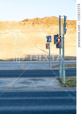 Traffic lights on red signal at a crosswalk Traffic lights on red signal at a crosswalk 133815378