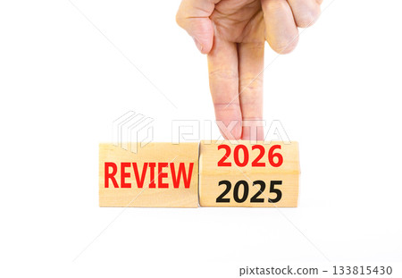 2026 Review symbol. Concept words 2026 Review on beautiful wooden blocks. Beautiful white paper background. Businessman's hand. Business and 2026 review concept. Copy space. 133815430