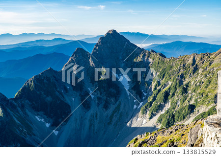 Early morning view of Mount Maehotaka and the north ridge from the terrace of Kitahotaka hut. Climbing Mount Kitahotaka in the Northern Alps Early morning view of Mount Maehotaka and the north ridge from the terrace of Kitahotaka hut. Climbing Mount Kitahotaka in the Northern Alps 133815529