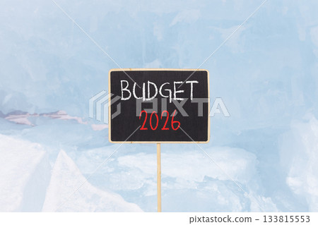 Budget 2026 symbol. Concept words Budget 2026 on beautiful black blackboard. Beautiful blue lake Baikal ice background. Business and budget 2026 concept. Copy space. Budget 2026 symbol. Concept words Budget 2026 on beautiful black blackboard. Beautiful blue lake Baikal ice background. Business and budget 2026 concept. Copy space. 133815553