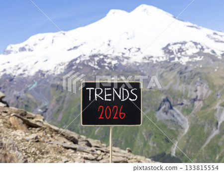Trends 2026 new year symbol. Concept words Trends 2026 on beautiful black blackboard. Beautiful mountain Elbrus and blue sky background. Business and Trends 2026 new year concept. Copy space. Trends 2026 new year symbol. Concept words Trends 2026 on beautiful black blackboard. Beautiful mountain Elbrus and blue sky background. Business and Trends 2026 new year concept. Copy space. 133815554