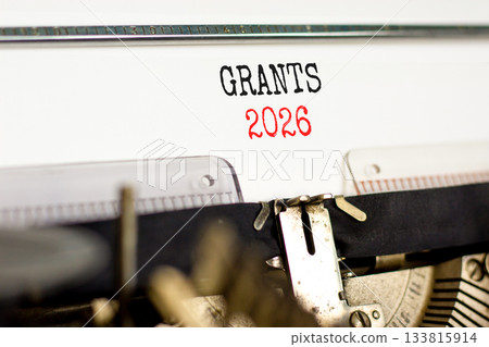 Grants 2026 symbol. Concept words Grants 2026 typed on beautiful old retro typewriter. Beautiful white paper background. Beautiful old typewriter. Business and grants 2026 concept. Copy space. 133815914