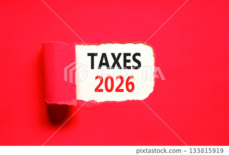 Taxes 2026 new year symbol. Concept words Taxes 2026 on beautiful white paper. Beautiful red paper background. Business and taxes 2026 new year concept. Copy space. Taxes 2026 new year symbol. Concept words Taxes 2026 on beautiful white paper. Beautiful red paper background. Business and taxes 2026 new year concept. Copy space. 133815919