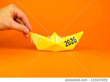 Business concept of 2026 new year symbol. Concept number 2026 Happy new year on beautiful yellow paper boat. Beautiful orange background. Business 2026 happy new year concept. Copy space. Business concept of 2026 new year symbol. Concept number 2026 Happy new year on beautiful yellow paper boat. Beautiful orange background. Business 2026 happy new year concept. Copy space. 133815939