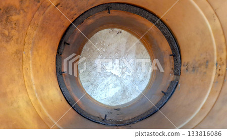 Abstract View Down Inside a Dirty Circular Funnel or Pipe 133816086
