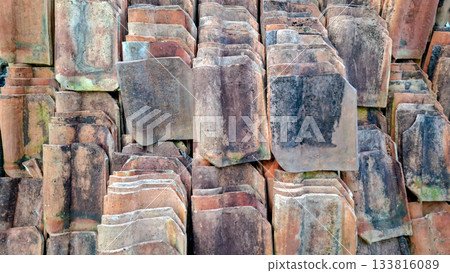 Front View of Weathered Terracotta Roof Tile Stacks 133816089