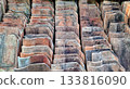 Close-up Stacked Rows of Traditional Terracotta Roof Tiles 133816090