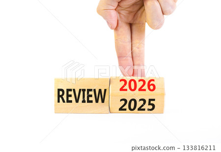 2026 Review symbol. Concept words 2026 Review on beautiful wooden blocks. Beautiful white paper background. Businessman's hand. Business and 2026 review concept. Copy space. 133816211