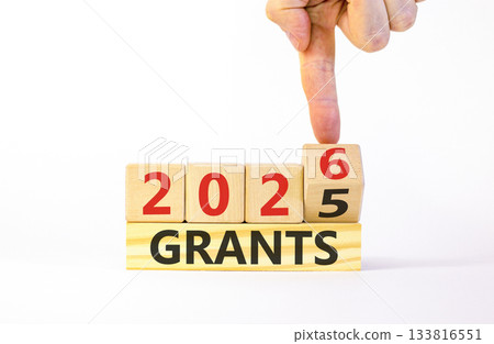 2026 Grants symbol. Concept words 2026 Grants on beautiful wooden blocks. Beautiful white paper background. Businessman's hand. Business and 2026 grants concept. Copy space. 2026 Grants symbol. Concept words 2026 Grants on beautiful wooden blocks. Beautiful white paper background. Businessman's hand. Business and 2026 grants concept. Copy space. 133816551