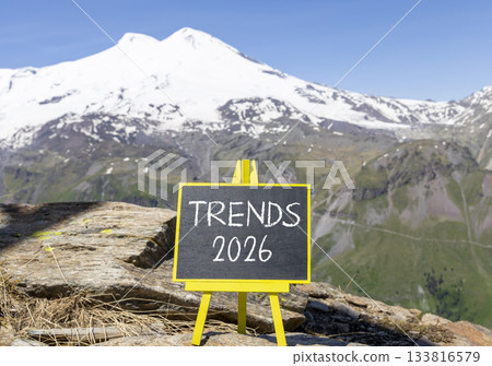 Trends 2026 new year symbol. Concept words Trends 2026 on beautiful black blackboard. Beautiful mountain Elbrus and blue sky background. Business and Trends 2026 new year concept. Copy space. Trends 2026 new year symbol. Concept words Trends 2026 on beautiful black blackboard. Beautiful mountain Elbrus and blue sky background. Business and Trends 2026 new year concept. Copy space. 133816579
