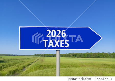 2026 taxes new year symbol. Concept words 2026 taxes on beautiful blue road sign. Beautiful green grass field forest and blue sky background. Business and 2026 taxes new year concept. Copy space. 2026 taxes new year symbol. Concept words 2026 taxes on beautiful blue road sign. Beautiful green grass field forest and blue sky background. Business and 2026 taxes new year concept. Copy space. 133816605
