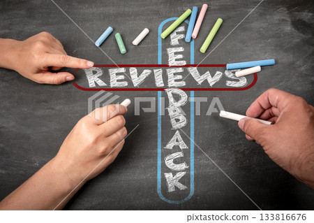 Feedback and Reviews Concept Written with Chalk on Blackboard by Two People Feedback and Reviews Concept Written with Chalk on Blackboard by Two People 133816676