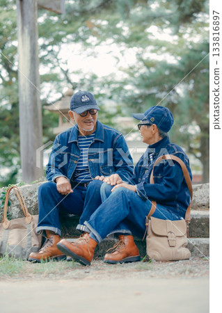 Senior couple visiting a shrine Senior couple visiting a shrine 133816897