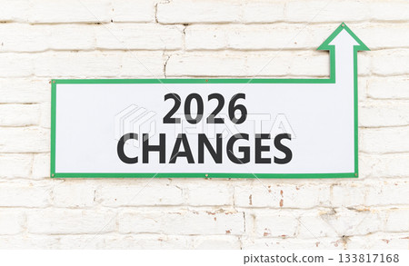 2026 Changes symbol. Concept words 2026 Changes on beautiful white sign with arrow. Beautiful old white brick wall background. Business and 2026 changes concept. Copy space. 133817168