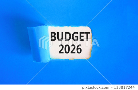 Budget 2026 symbol. Concept words Budget 2026 on beautiful white paper. Beautiful blue paper background. Business and budget 2026 concept. Copy space. Budget 2026 symbol. Concept words Budget 2026 on beautiful white paper. Beautiful blue paper background. Business and budget 2026 concept. Copy space. 133817244