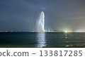 A spectacular view of the giant fountain at night from the opposite bank 133817285