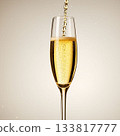 Champagne poured into a glass 133817777