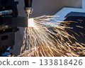 Close up scene the fiber laser cutting machine cut  the square stainless steel tube. 133818426