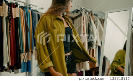 Fashion Trends Experiencing the Joy of Trying on Various Outfits in a Stylish Clothing Store Fashion Trends Experiencing the Joy of Trying on Various Outfits in a Stylish Clothing Store 133818515
