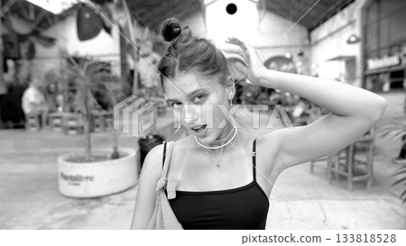 An Artistic and Stylish Portrait of a Young Woman Captured in a Vibrant Urban Setting An Artistic and Stylish Portrait of a Young Woman Captured in a Vibrant Urban Setting 133818528