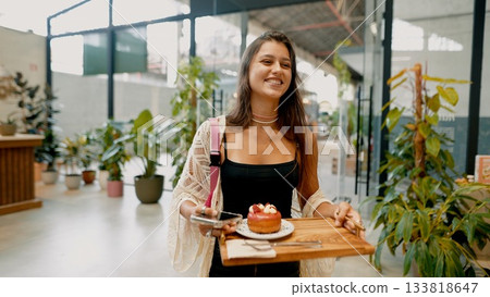 Delightful Moment in a Cozy Caf with a Delicious Dessert 133818647