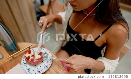 Enjoying Dessert in a Cozy Caf Setting Enjoying Dessert in a Cozy Caf Setting 133818696