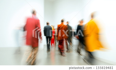 Diverse individuals move creating streaks of colorful motion against a light background. Blurred people banner Diverse individuals move creating streaks of colorful motion against a light background. Blurred people banner 133819481