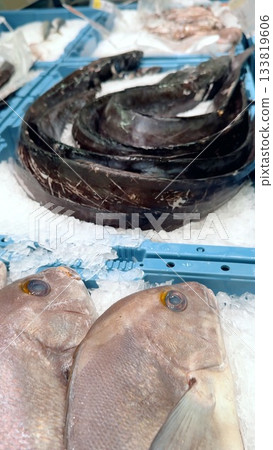 Fresh and Vibrant Seafood Display at the Local Market for Your Dining Pleasure and Enjoyment 133819606