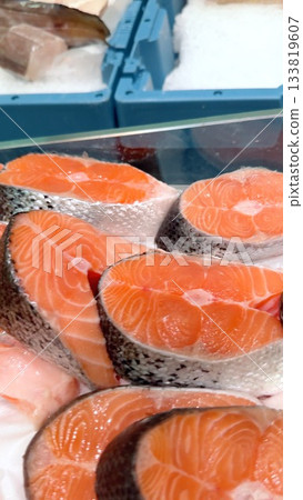 Beautifully Fresh Salmon Cuts are Artistically Displayed at the Local Seafood Market Beautifully Fresh Salmon Cuts are Artistically Displayed at the Local Seafood Market 133819607