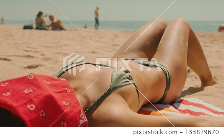 Enjoy a Relaxing Day at the Beautiful Beach with Sunbathing and Great Experiences 133819670